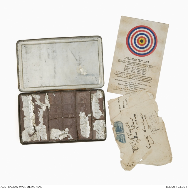 The gift tin with chocolate and novelty postcard